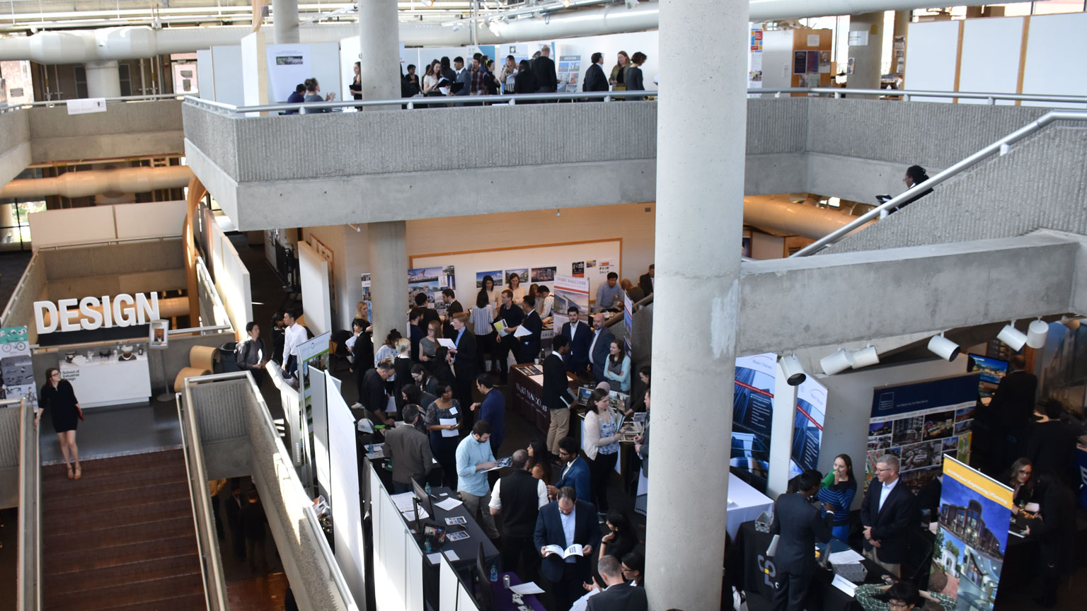 Career Fair 2018 occurring on all three levels of the Architecture West building.
