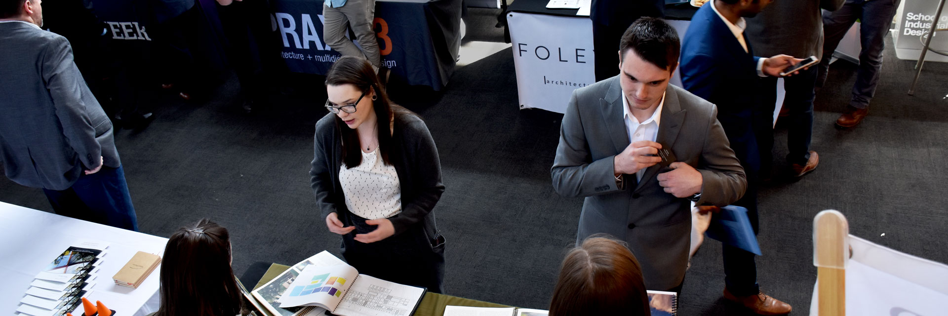 Students at Career Fair 2018 speaking to a recruiter.